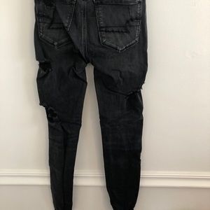 Faded black ripped jeans American eagle